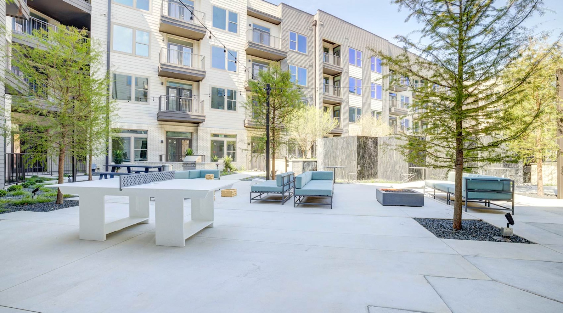 a courtyard with a fire pit